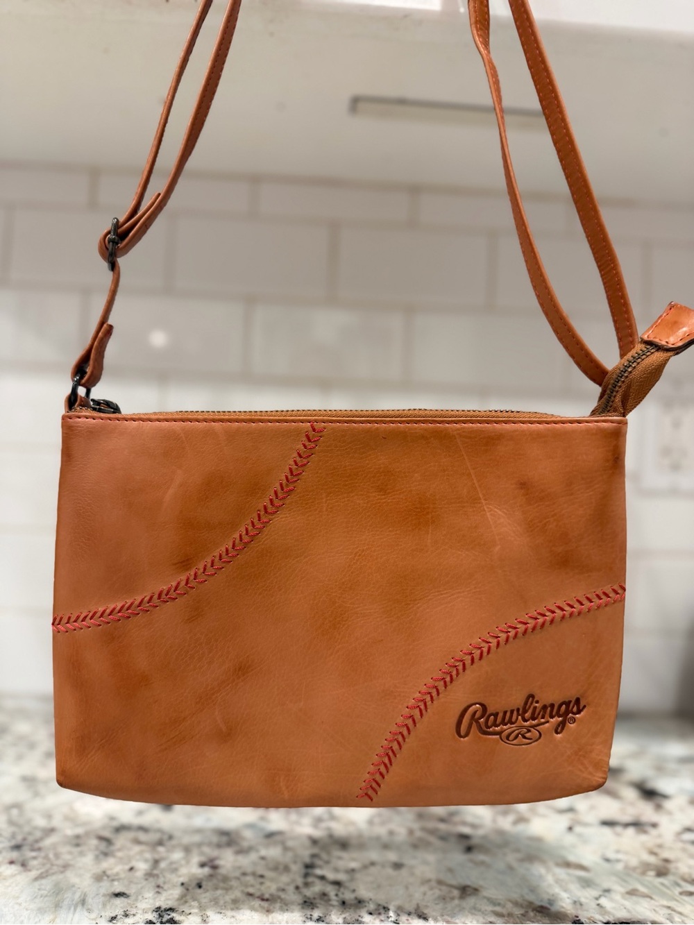 Rawlings Tan Leather Crossbody Bag with Red Stitching Detail